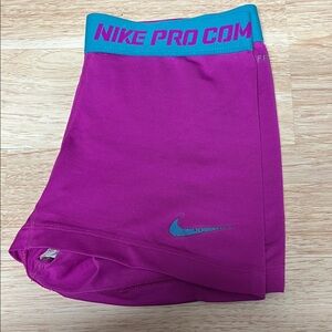 Nike Pro Magenta Shorts with Teal Accents